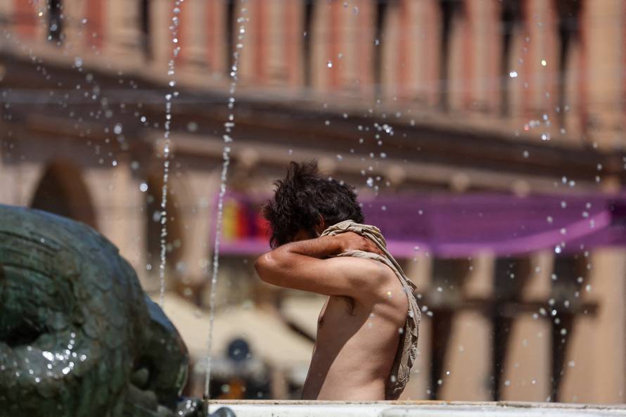 Bologna seeks shade and water as heatwave grips Italy