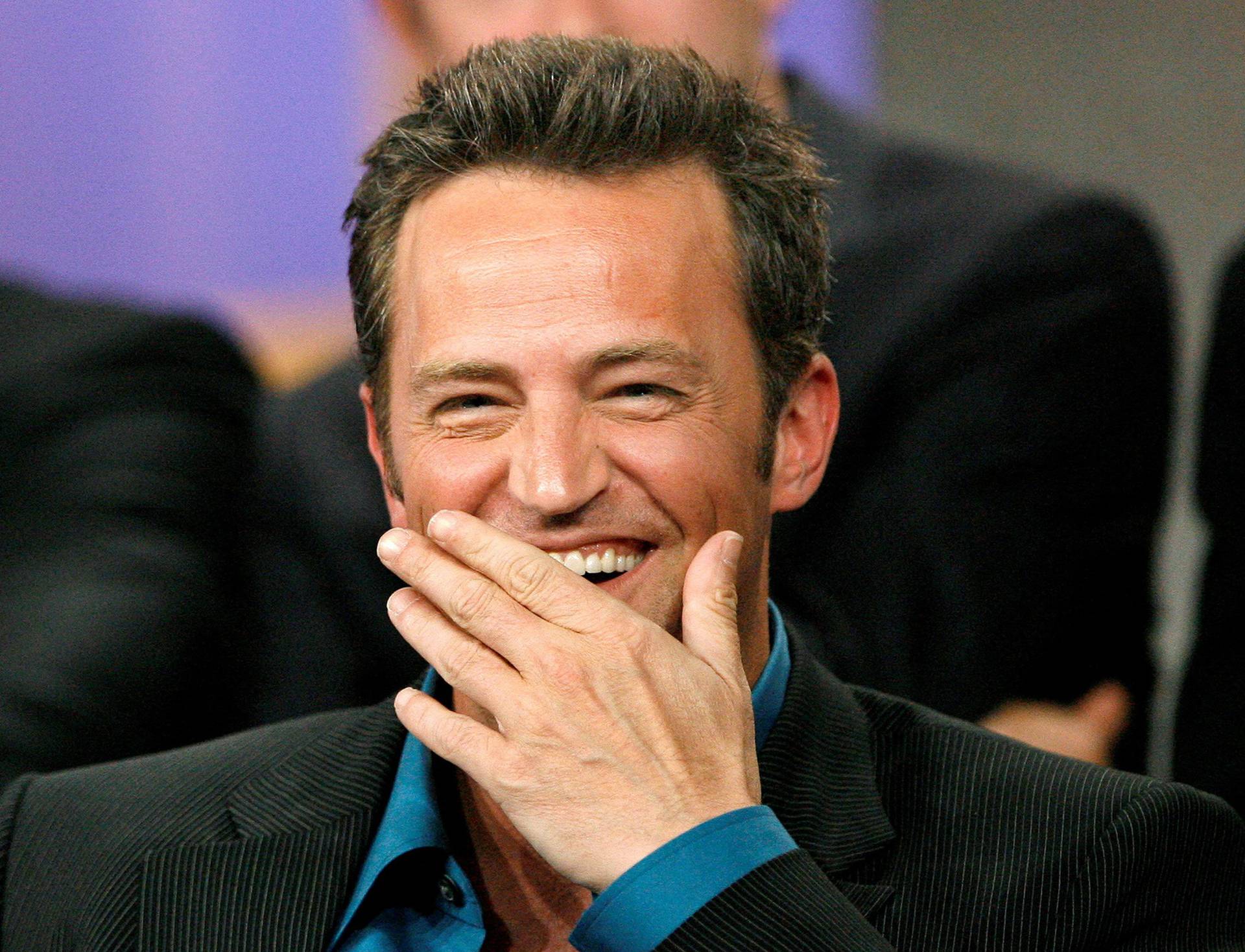 FILE PHOTO: Cast member Perry smiles at a panel at the Television Critics Association summer 2006 media tour in Pasadena