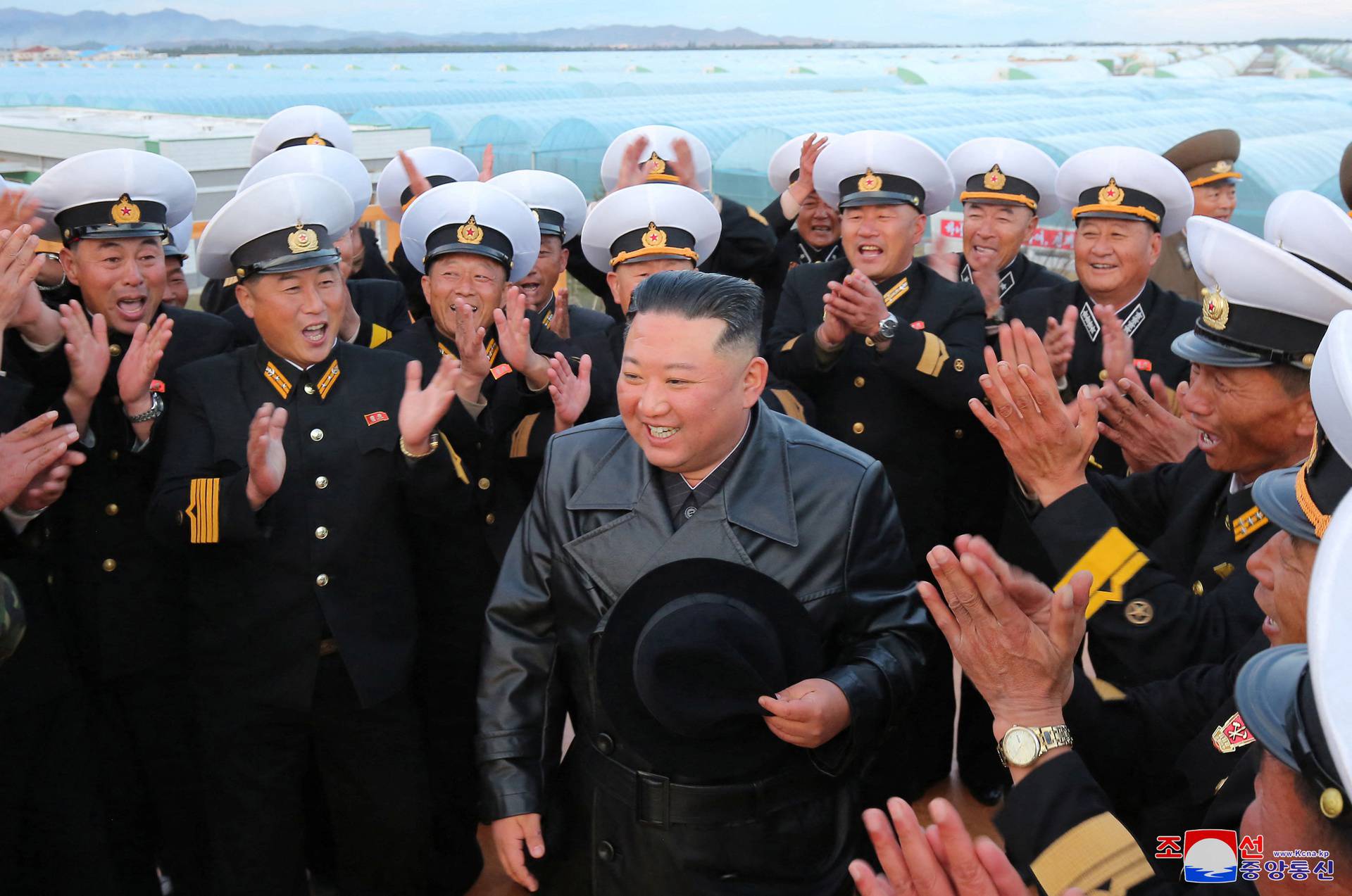 North Korea's leader Kim Jong Un attends the opening ceremony of the Ryonpho Greenhouse Farm