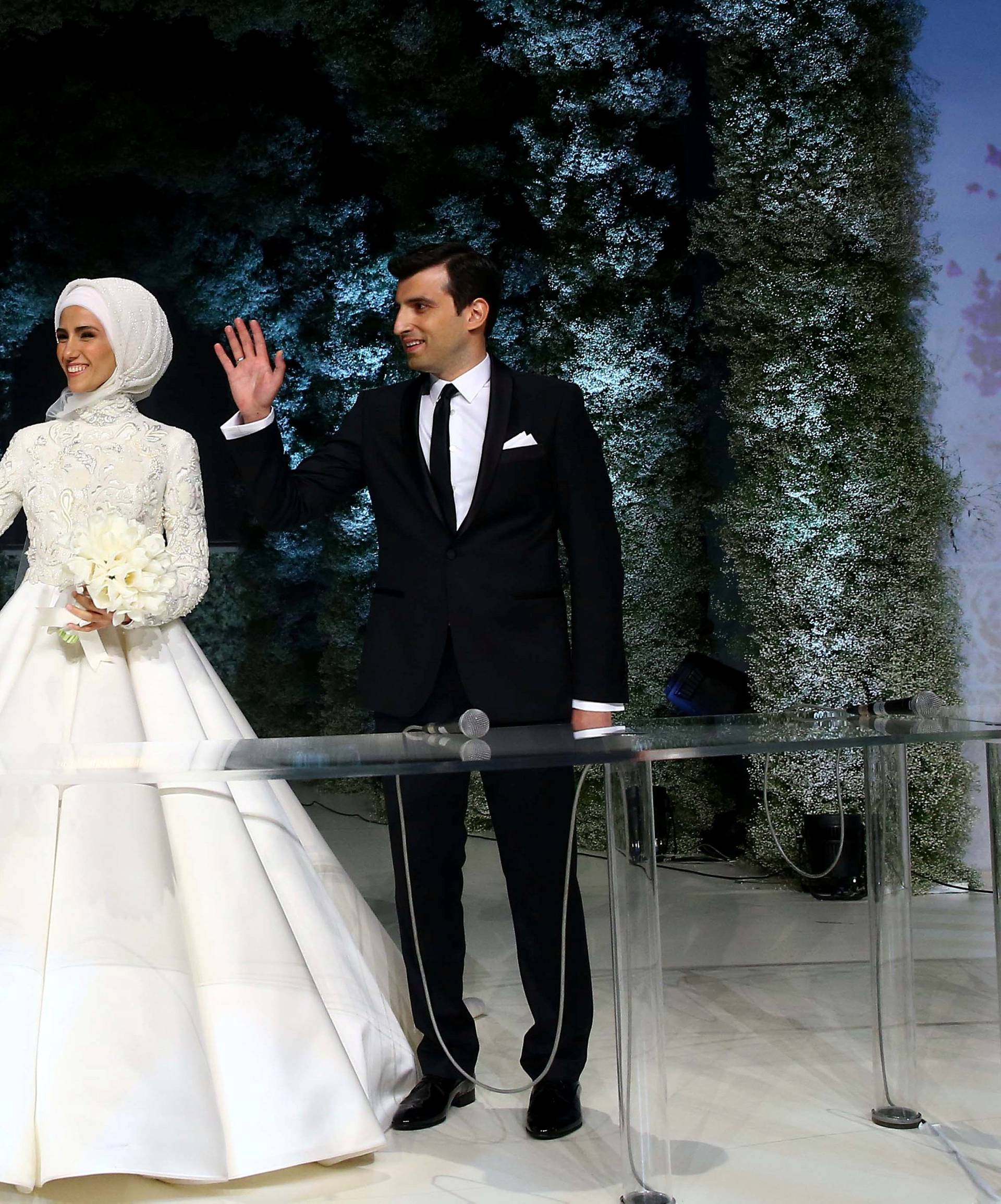 Sumeyye Erdogan, daughter of Turkish President Tayyip Erdogan, and her husband Selcuk Bayraktar are seen during their wedding ceremony in Istanbul