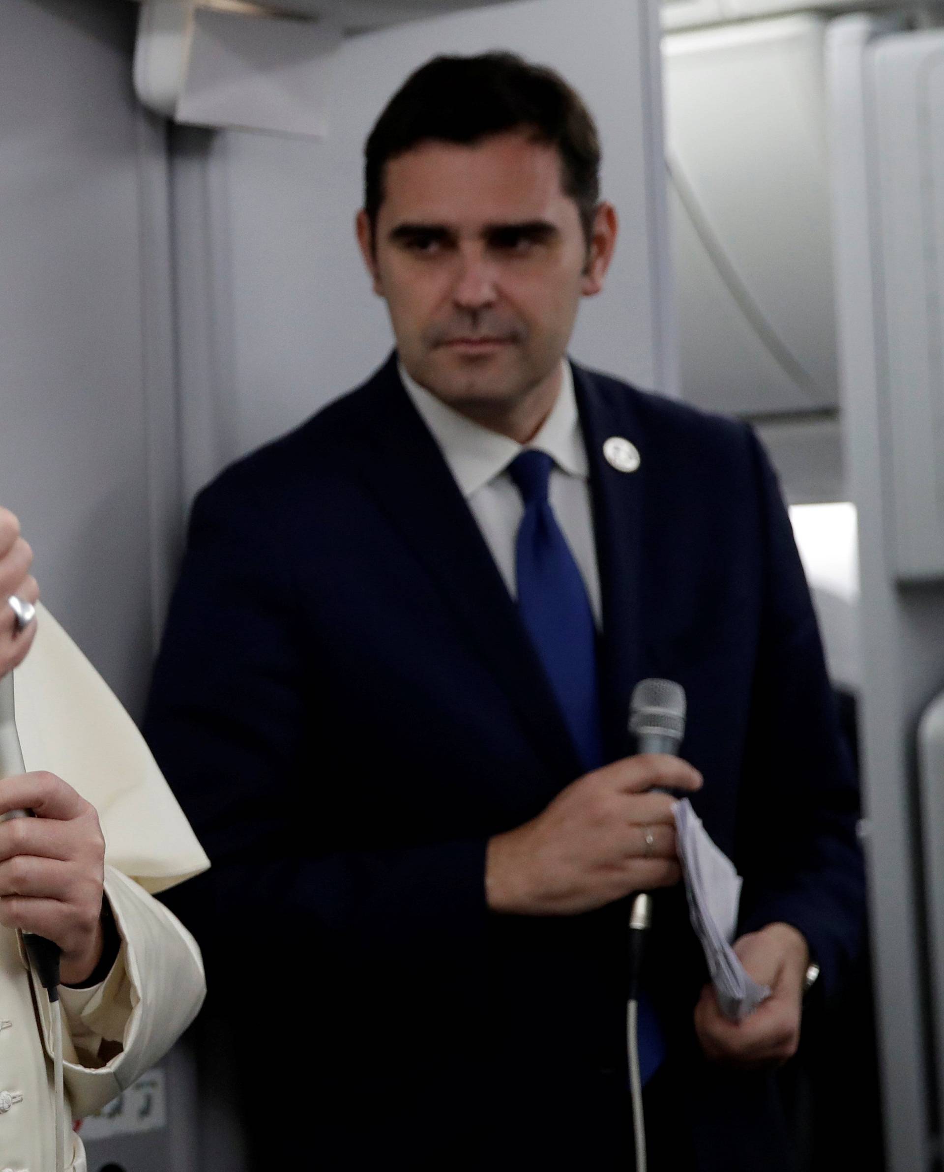 Pope Francis speaks during a news conference aboard a plane on the way back from Panama to Rome