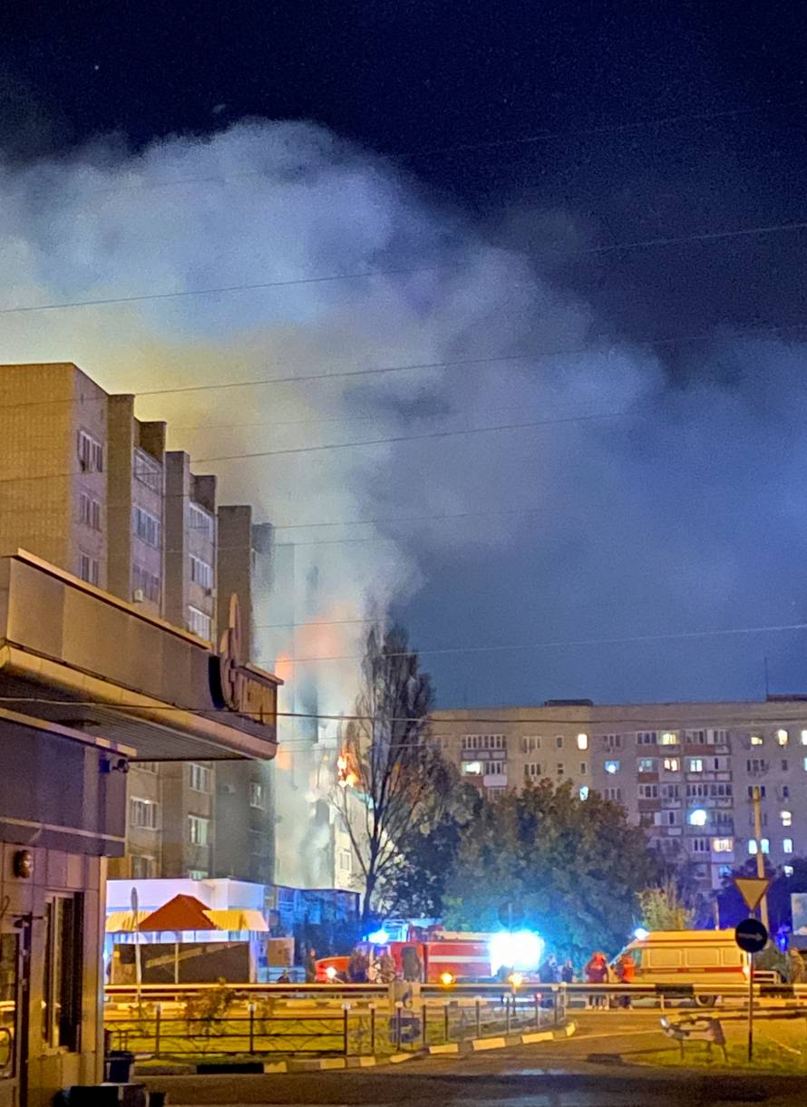 A view shows a site of a plane crash on residential building in the southern city of Yeysk