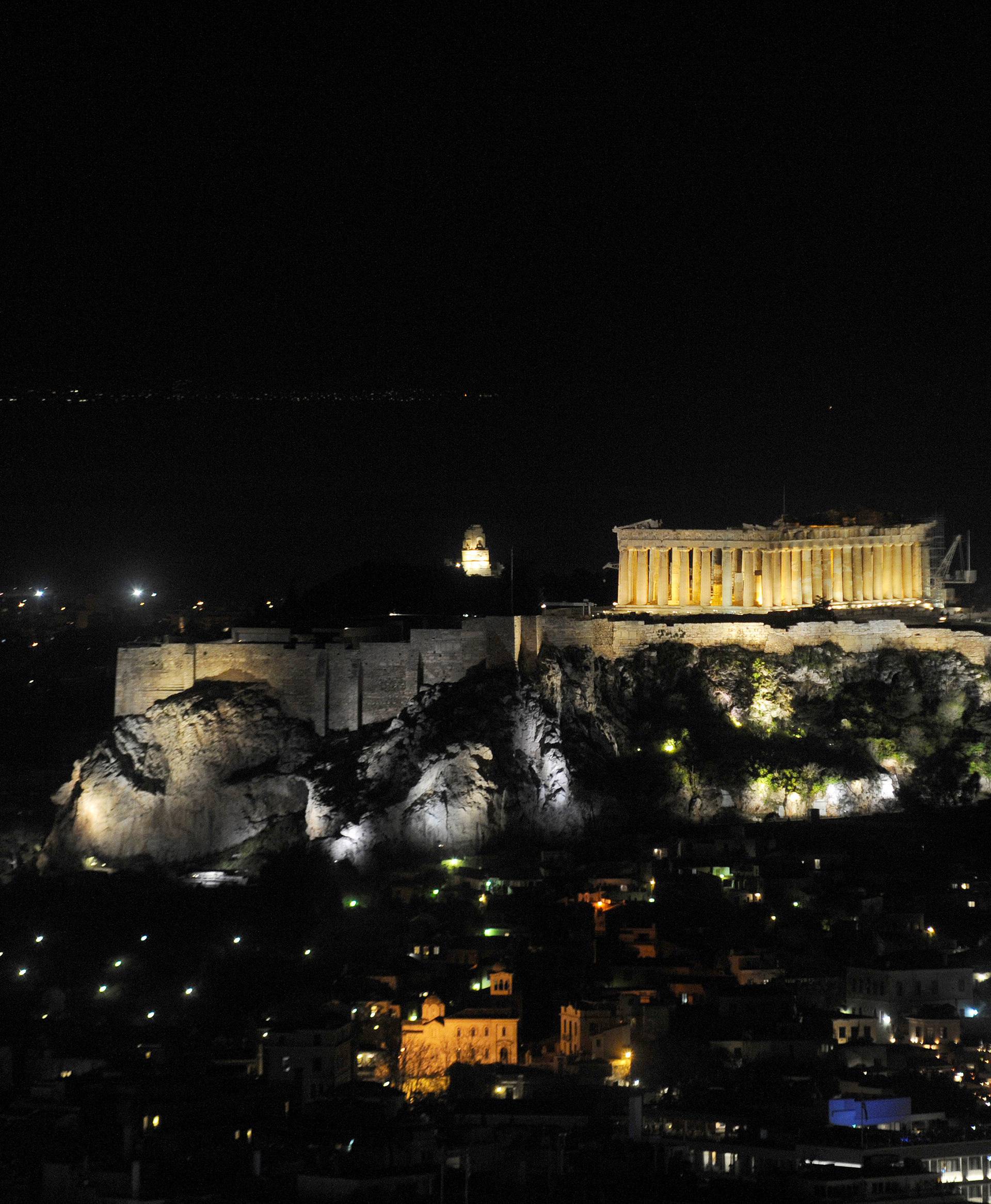 The hill of the Acropolis is pictured before Earth Hour in Athens, Greece