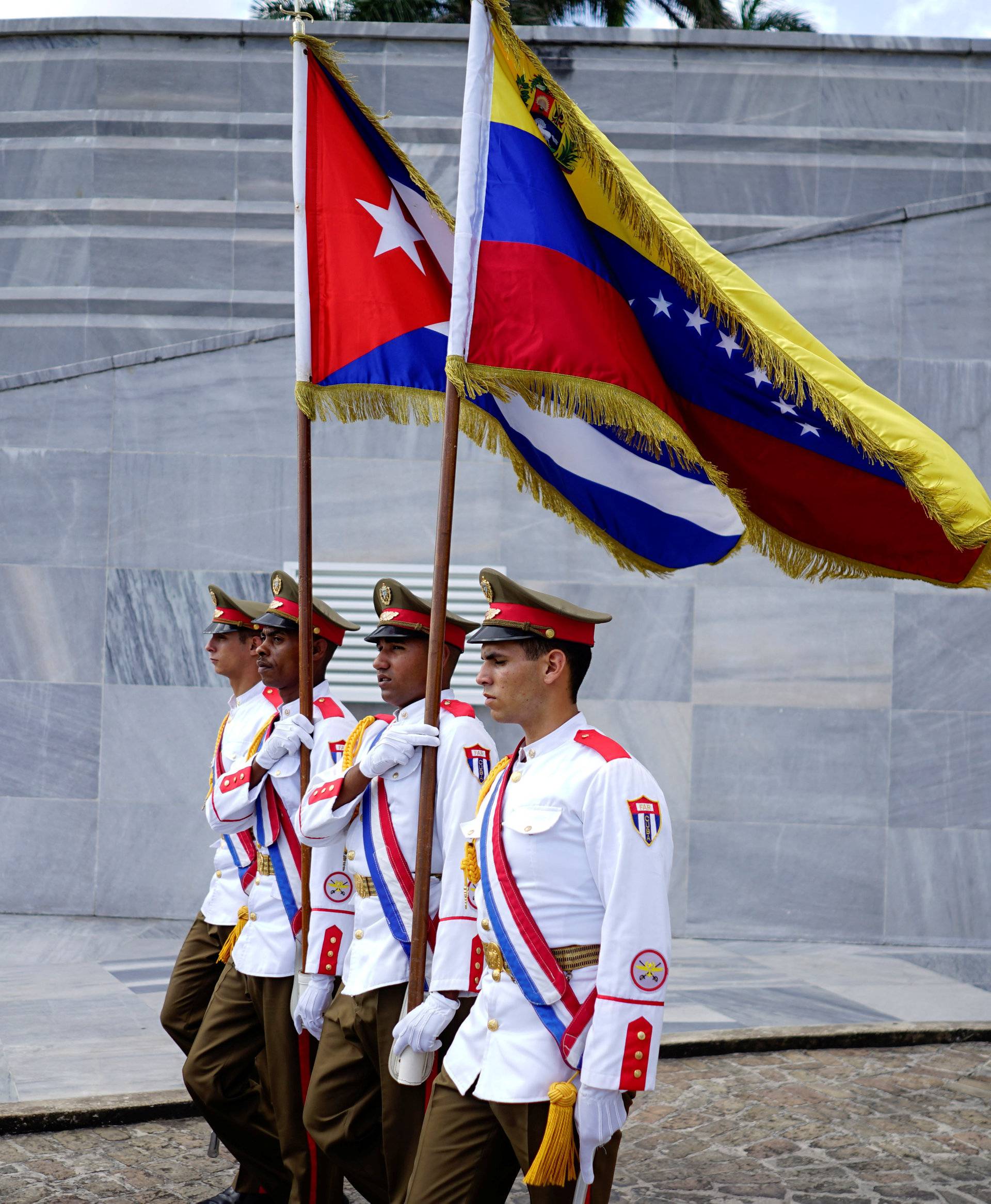 An honour guard arrives for a wreath-laying ceremony with Venezuela's President Nicolas Maduro at the Jose Marti monument in Havana