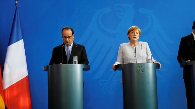 German Chancellor Merkel French President Hollande and Italian Prime Minister Renzi attend a news conference at the chancellery during discussions on the outcome of the Brexit in Berlin