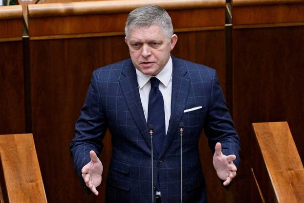 FILE PHOTO: Slovakia's PM Fico attends a parliamentary session during a no-confidence vote against his government