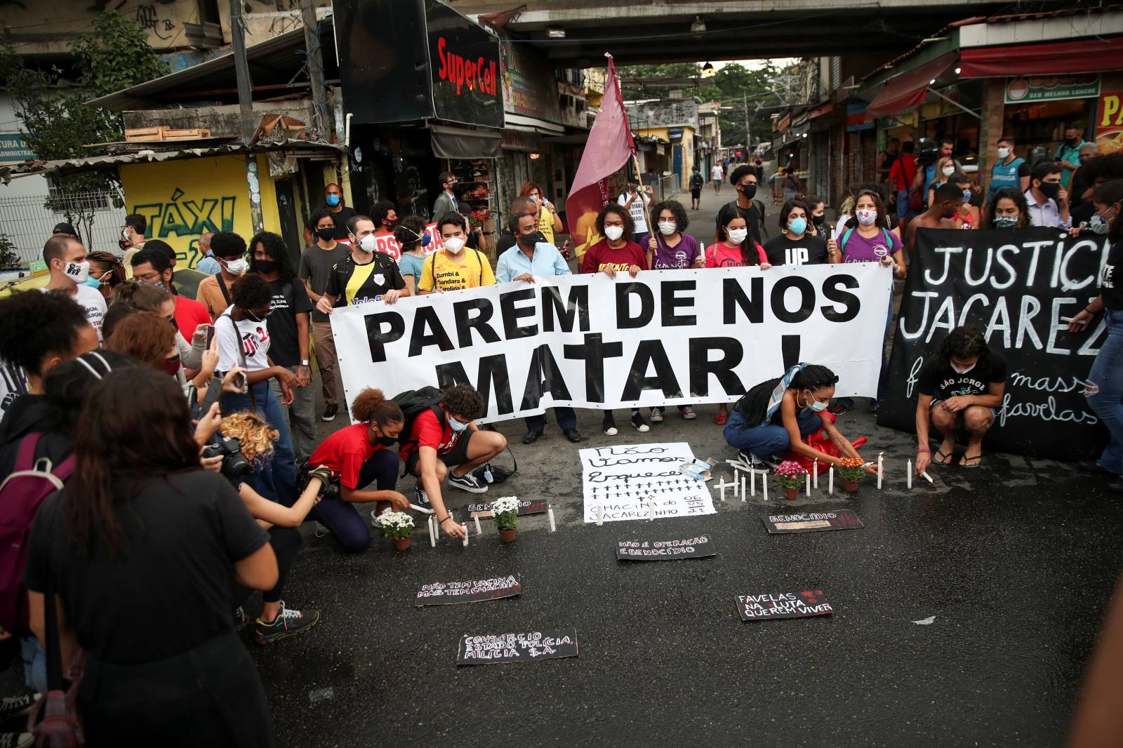 People protest against police violence outside Jacarezinho slum after a police operation which resulted in 25 deaths in Rio de Janeiro
