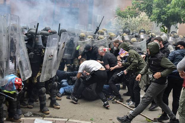 NATO Kosovo Force (KFOR) soldiers clash with local Kosovo Serb protesters in the town of Zvecan