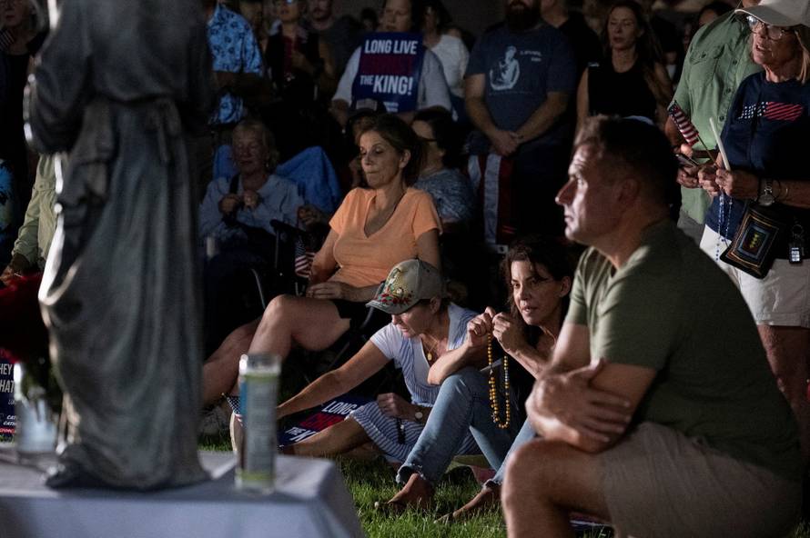 Catholics from across the Phoenix area gather to pray for Charlie Kirk, who was shot and killed in Utah, at Desert Horizon Park in Scottsdale