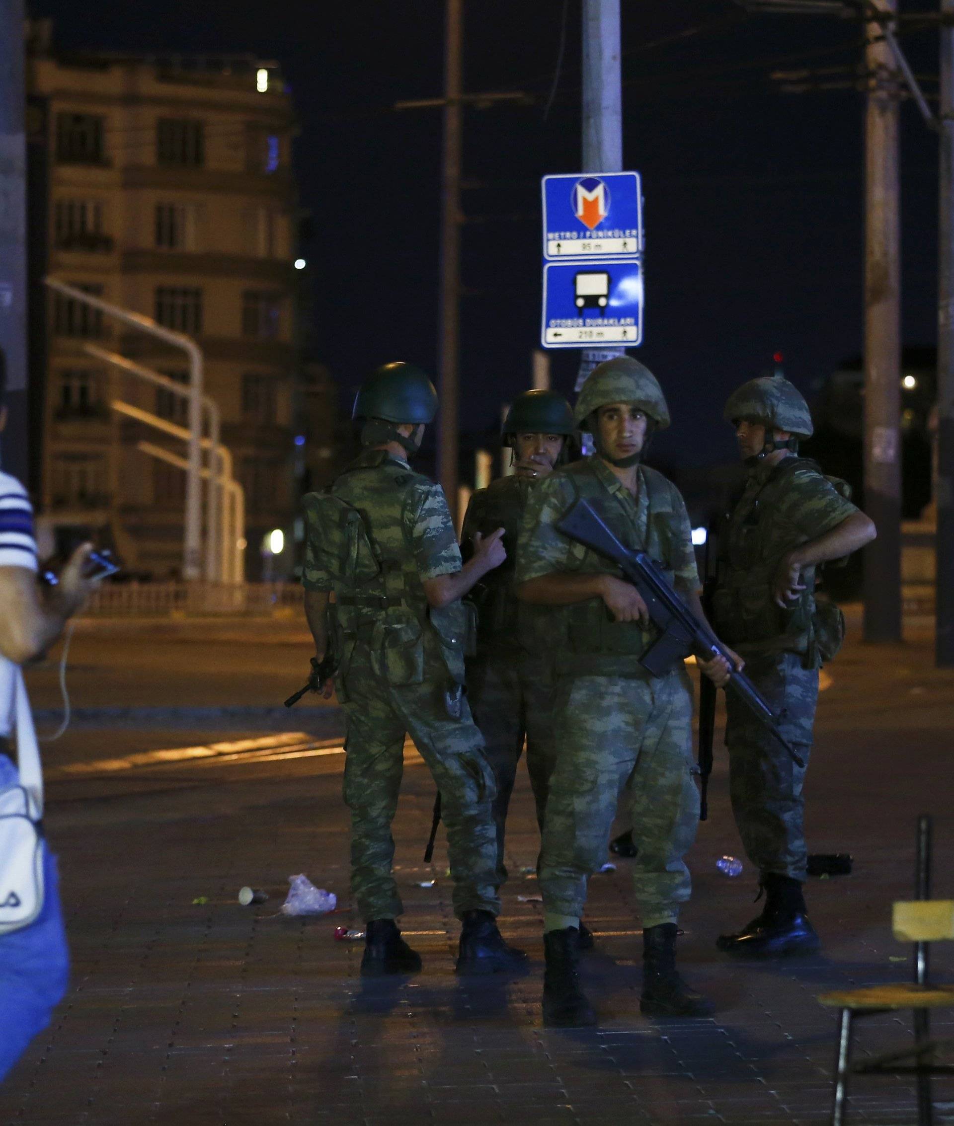 Turkish military stand guard near the the Taksim Square in Istanbul