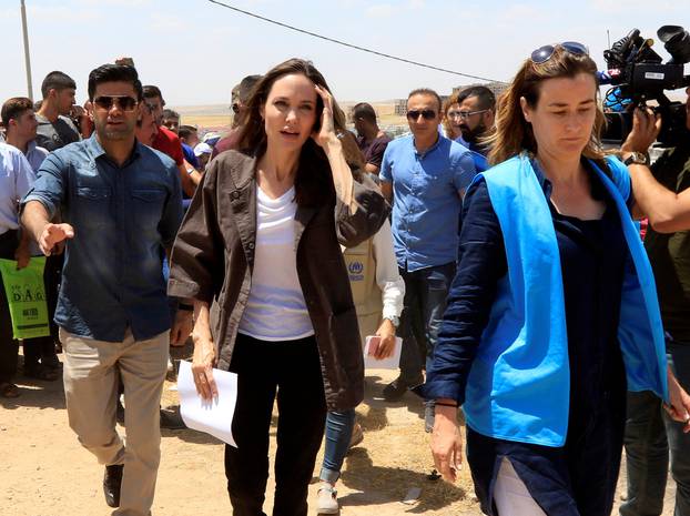 U.N. Refugee Agencyâs special envoy Angelina Jolie attends a news conference during her visits to a camp for Syrian refugees in Dohuk