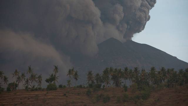 Mount Agung volcano erupts, as seen from Culik Village, Karangasem, Bali
