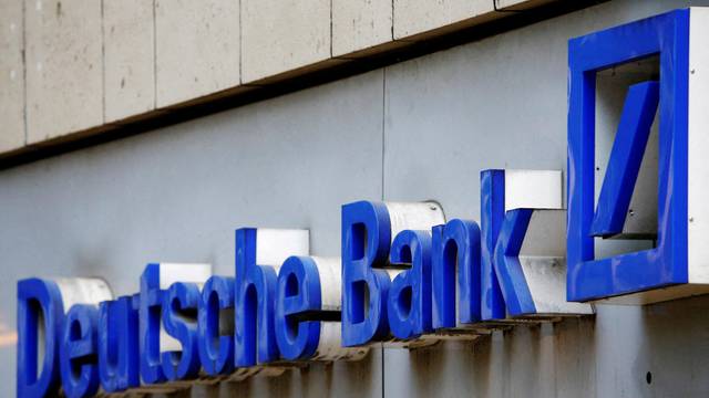 FILE PHOTO: A logo of a branch of Germany's Deutsche Bank is seen in Cologne, Germany