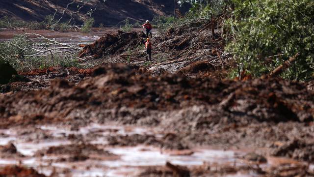 Rescue workers search for victims after a tailings dam owned by Brazilian miner Vale SA burst, in Brumadinho