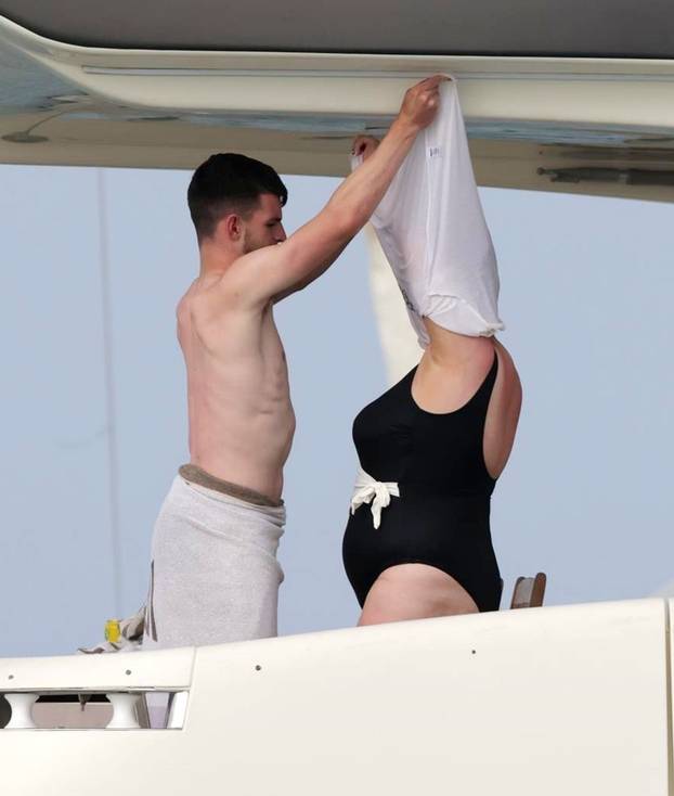 England footballer Declan Rice pictured on a luxury yacht with his girlfriend Lauren Fryer as they enjoy their holidays in Formentera!