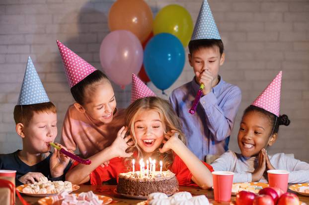 Kids,Looking,At,Birthday,Cake,With,Candles,,Having,B-day,Party