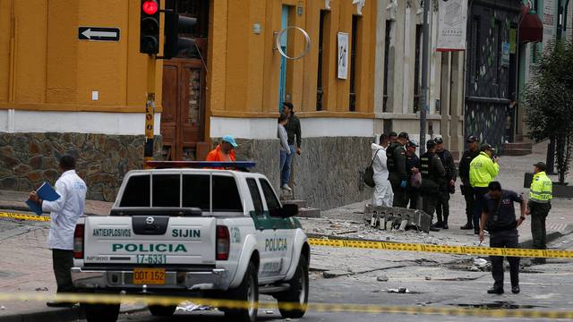 Police work the scene where an explosion occurred near Bogota's bullring