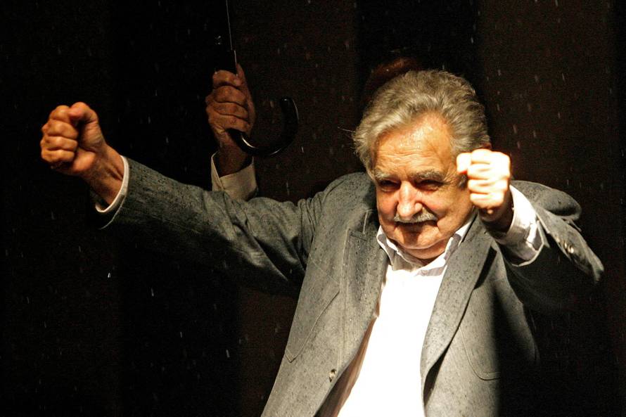 FILE PHOTO: Uruguay's president-elect Jose Mujica celebrates winning the presidential run-off election in Montevideo