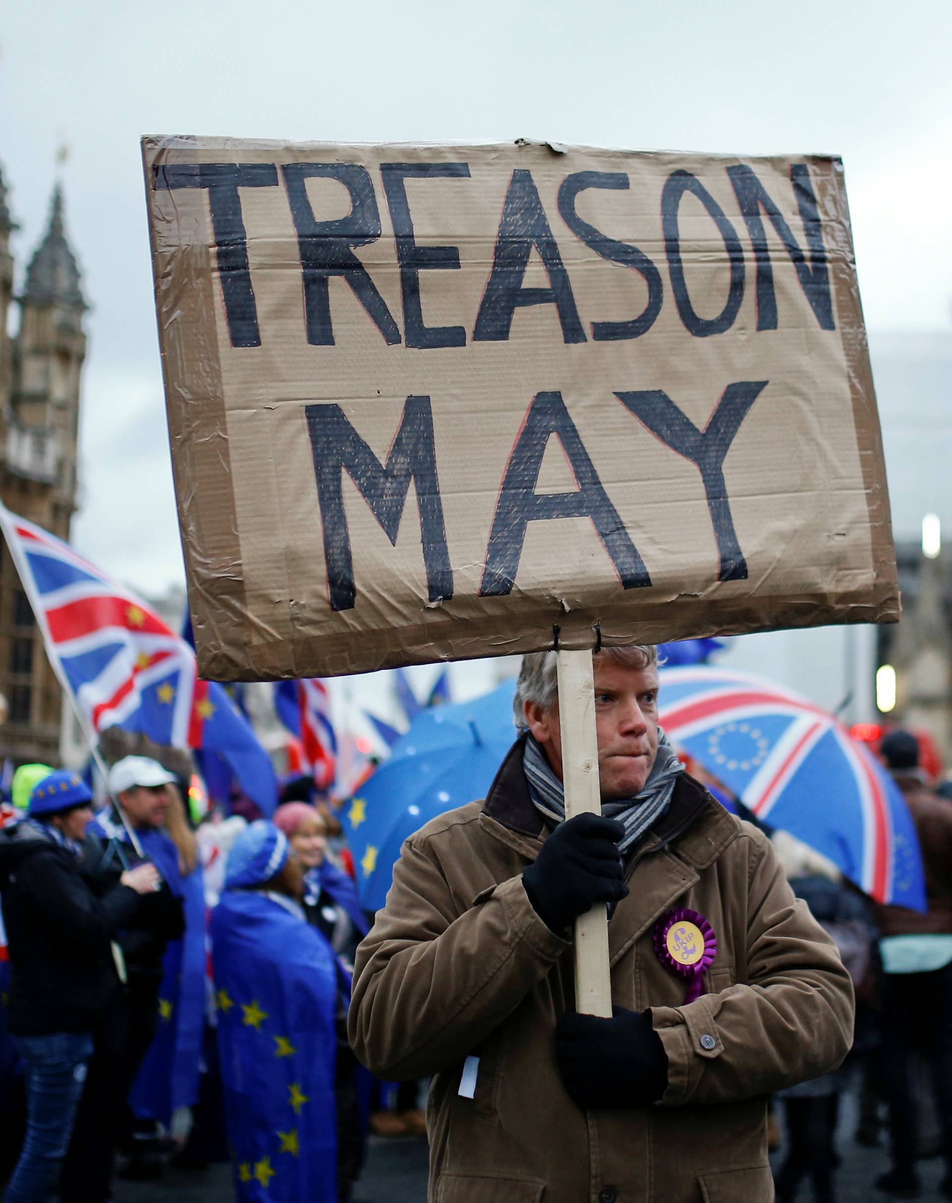 Pro-Brexit and anti-Brexit protesters demonstrate outside the Houses of Parliament in London