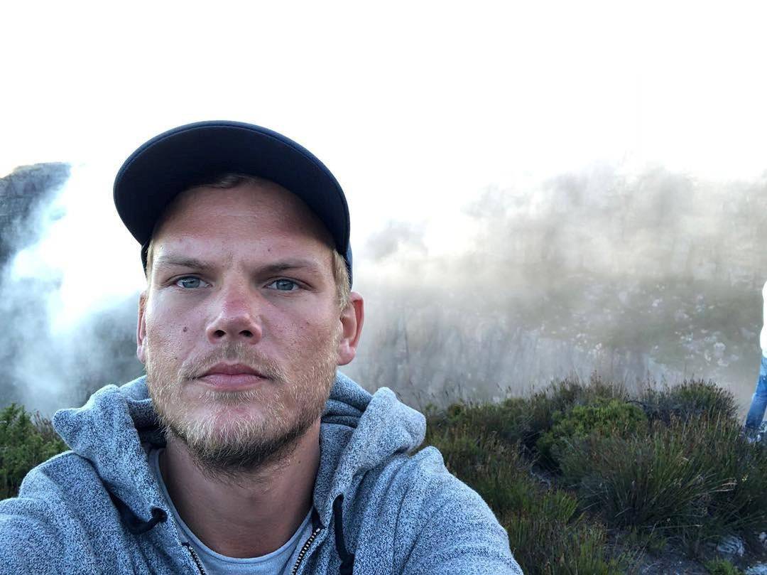 Swedish musician, DJ, remixer and record producer Avicii takes a selfie on Table Mountain
