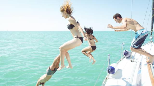 diving in the water during a boat excursion