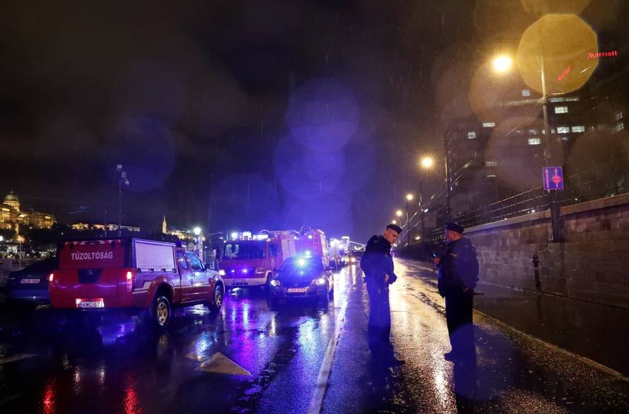 Police close the Danube bank after tourist boat capsized on the riverÂ in Budapest