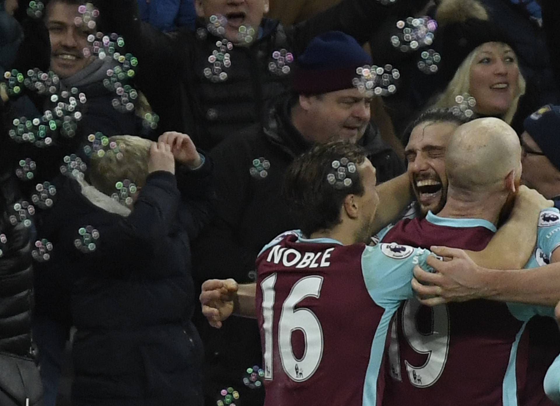 West Ham United's Andy Carroll celebrates scoring their second goal with teammates