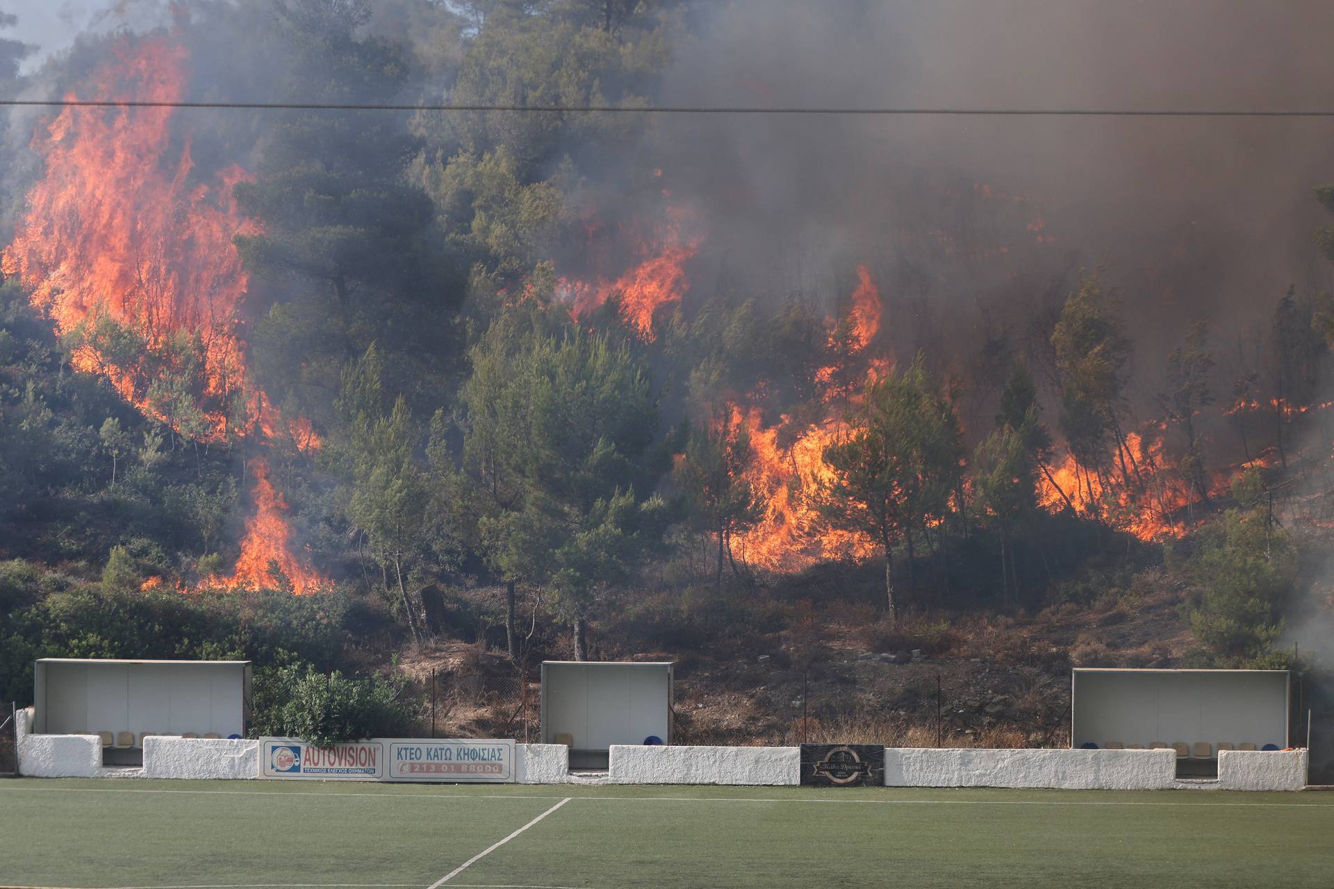 Wildfire burns in Stamata, near Athens