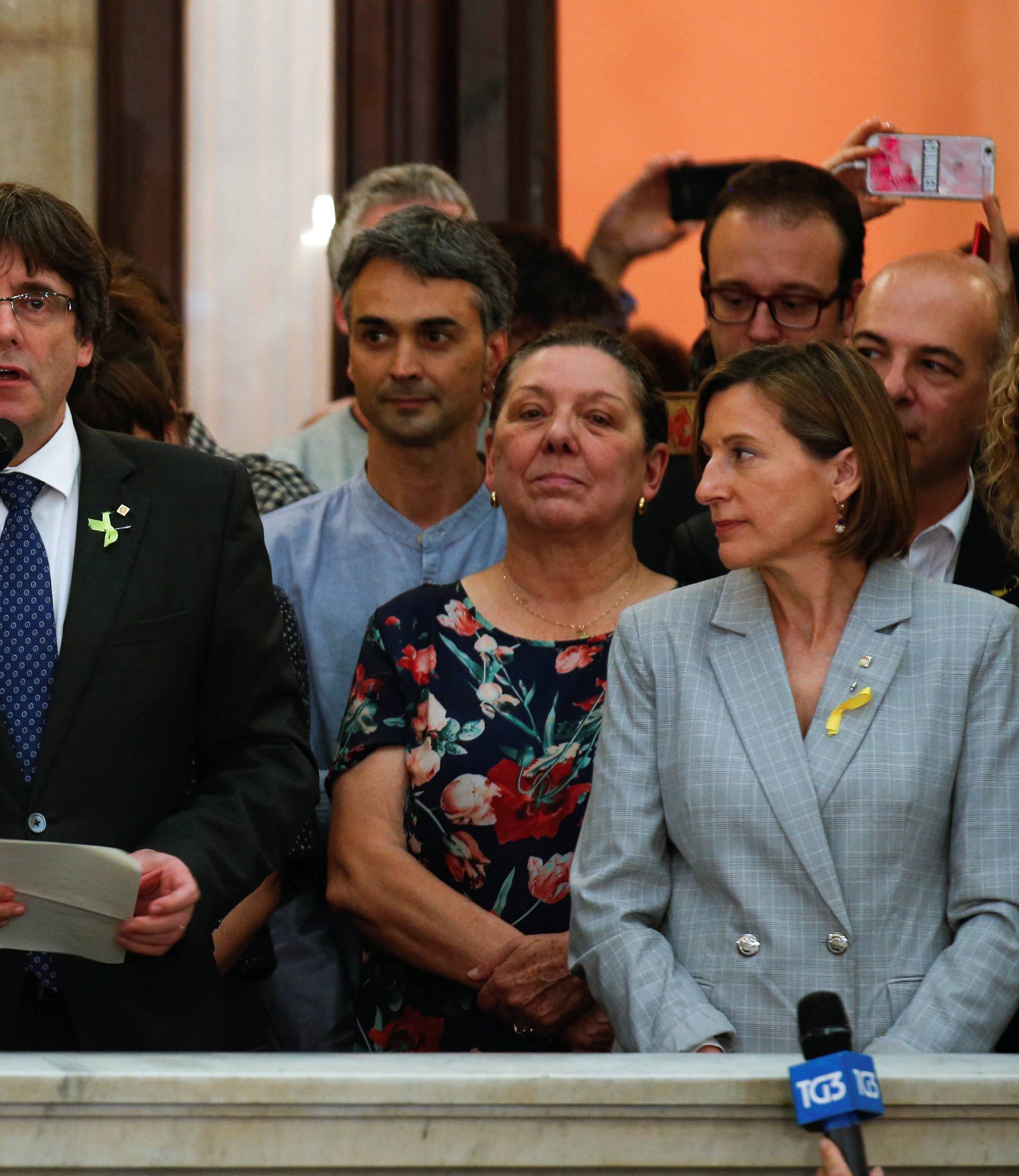 Catalan President Carles Puigdemont speaks during a ceremony after the Catalan regional Parliament declared independence from Spain in Barcelona