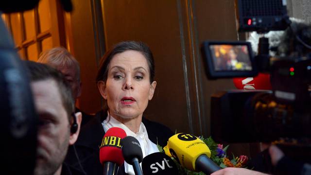 The Swedish Academy's Permanent Secretary Sara Danius talks to the media as she leaves after a  meeting at the Swedish Academy in Stockholm