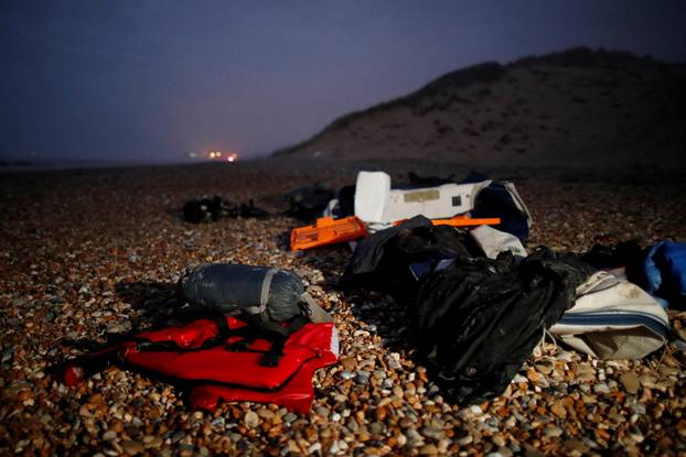 Migrant dinghy heads off the French coast to cross the English channel