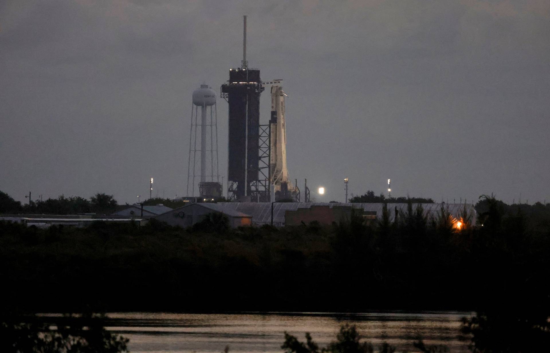 A SpaceX Falcon 9 rocket stands on the launch pad at the Kennedy Space Center in Cape Canaveral