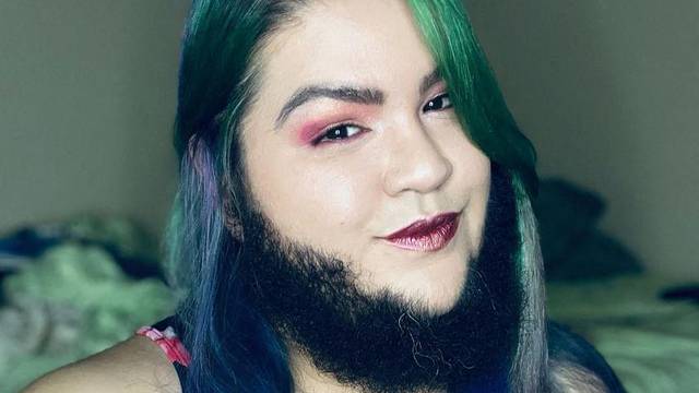 EXCLUSIVE: 'I'm a woman with a BEARD – it infuriates strangers but I love my hairy face and so does my boyfriend'