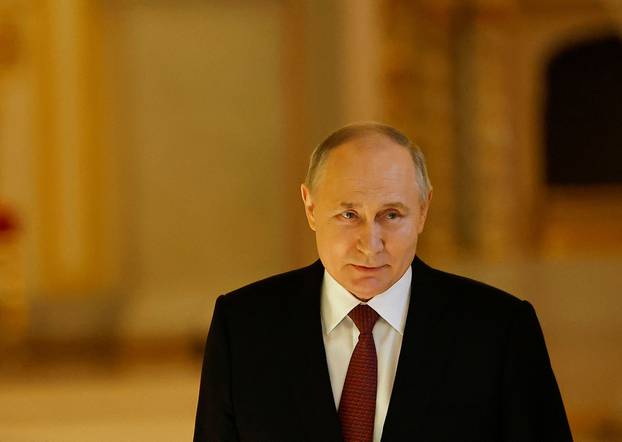 Russian President Putin meets with his election campaign confidants in Moscow