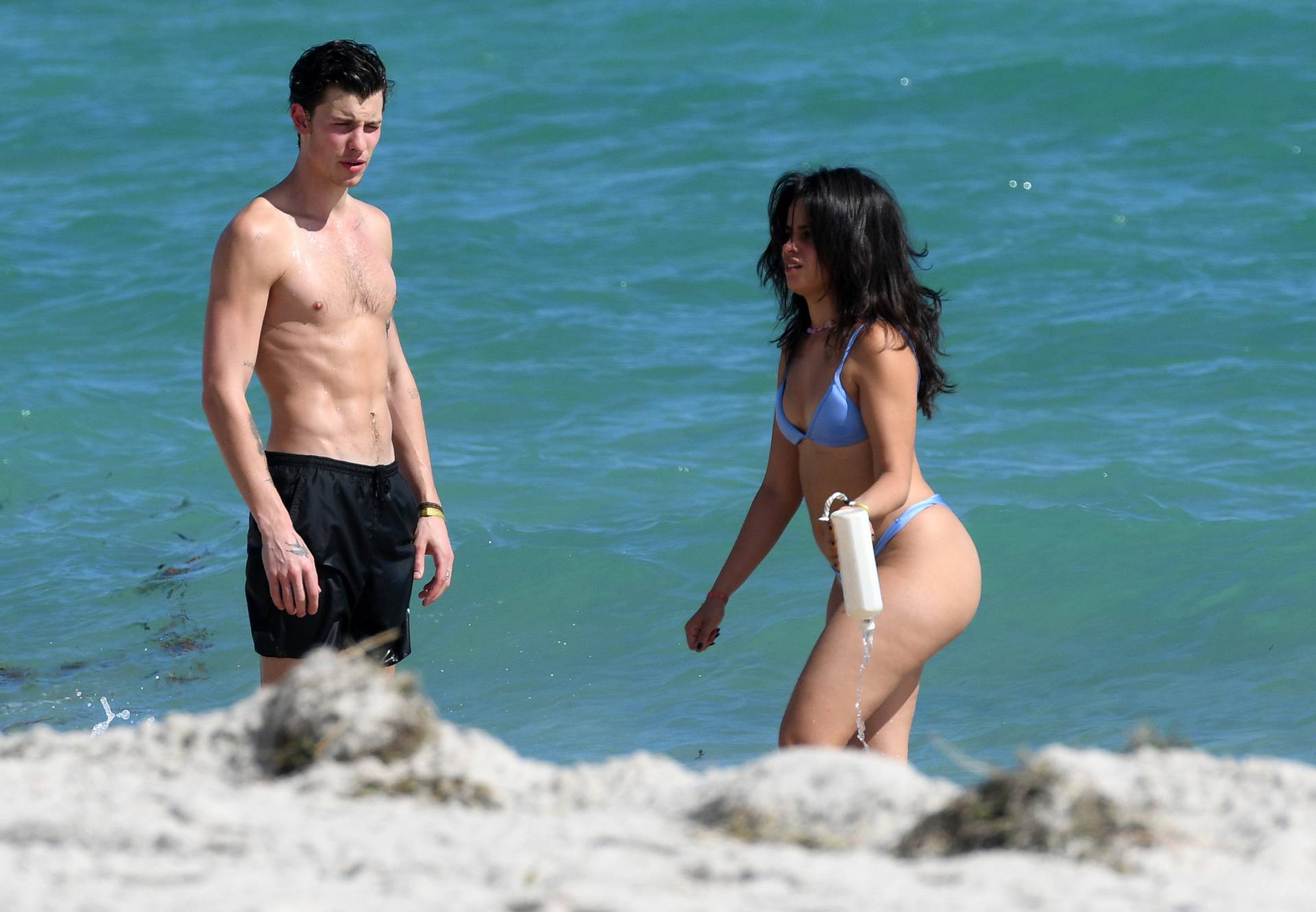 PREMIUM EXCLUSIVE: *NO WEB UNTIL 8PM EDT 4TH NOV* Bikini clad Camila Cabello and boyfriend Shawn Mendes enjoy the beach in Miami