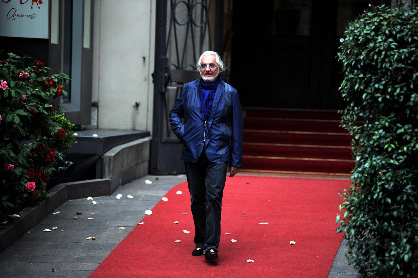 Milan, Flavio Briatore leaves a restaurant.