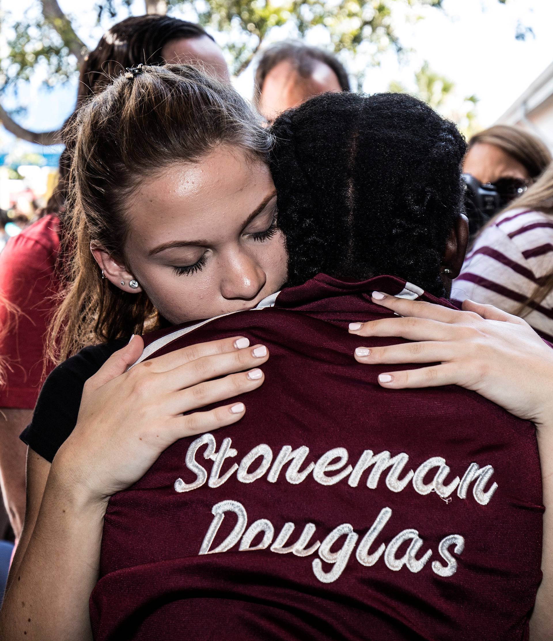 Students from Marjory Stoneman Douglas High School attend a memorial following a school shooting incident in Parkland