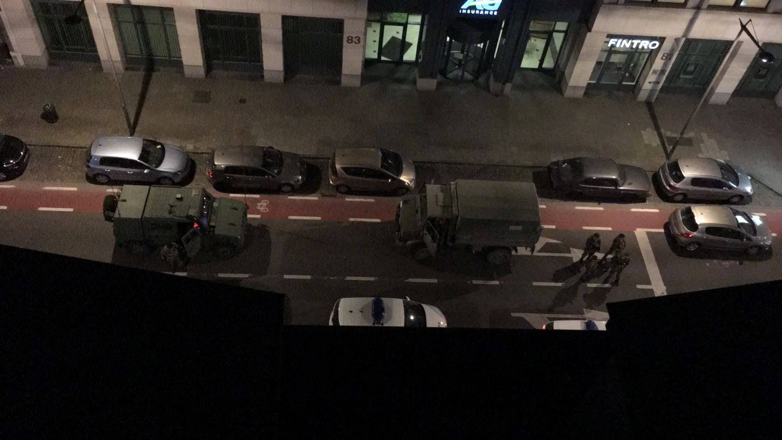 Belgian soldiers are seen at the scene where a man attacked two soldiers with a knife in Brussels