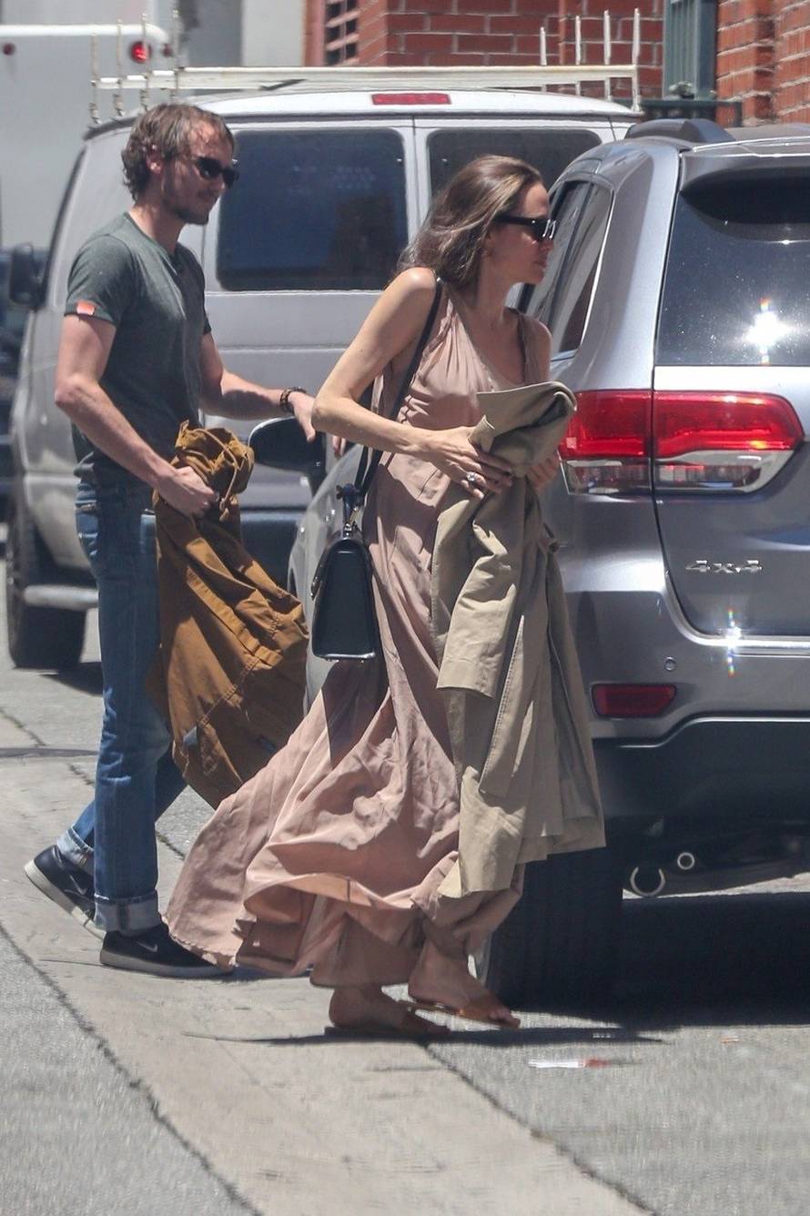 *EXCLUSIVE* Angelina Jolie shows off her arm tat while out visiting Beverly Hills clinic