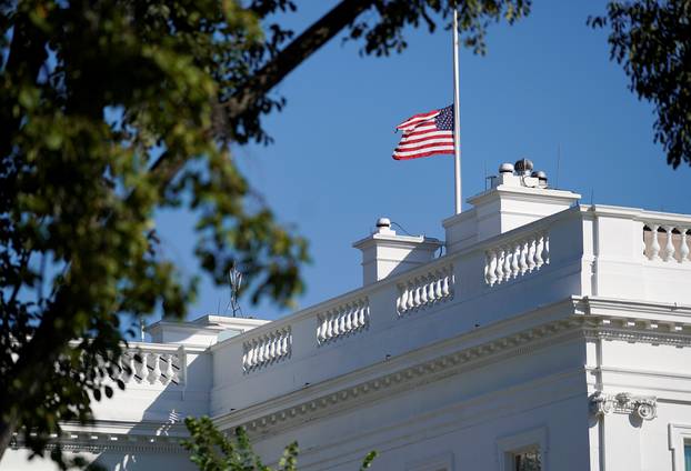 The U.S. flag flies at half-staff in the wake of a mass shooting in Las Vegas at the White House in Washington