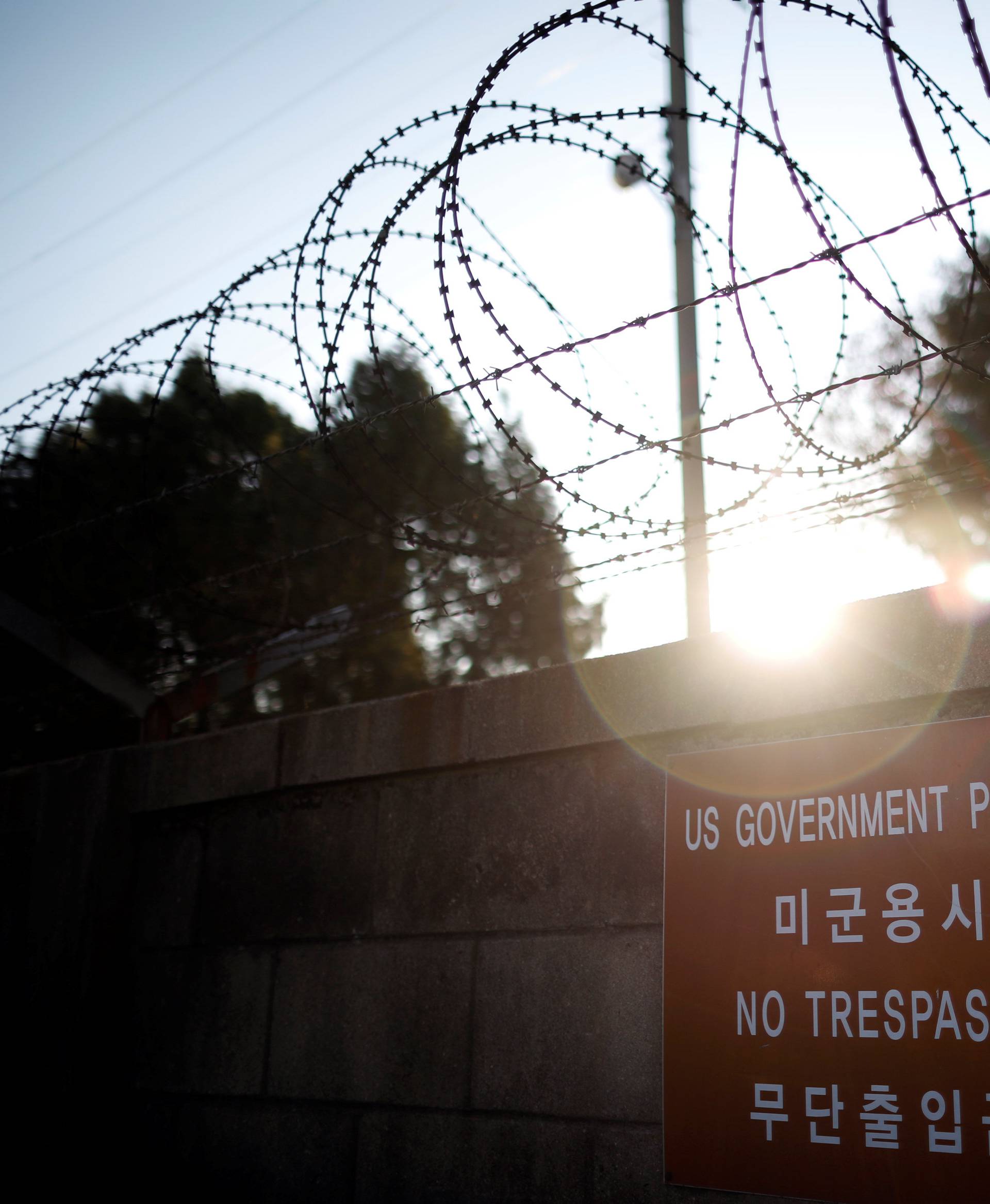 A barbed-wire fence is seen at a U.S. army base in Seoul