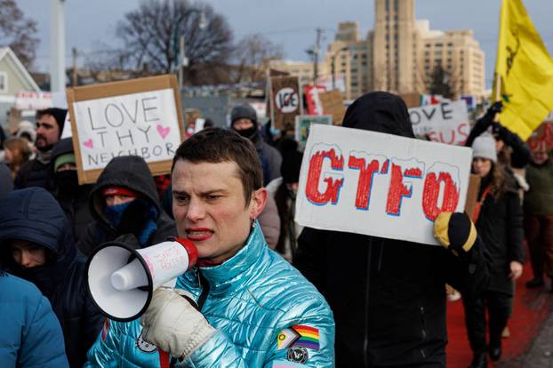 People protest against increased immigration enforcement after the fatal shooting of Renee Nicole Good by a U.S. Immigration and Customs Enforcement (ICE) agent, in Minneapolis