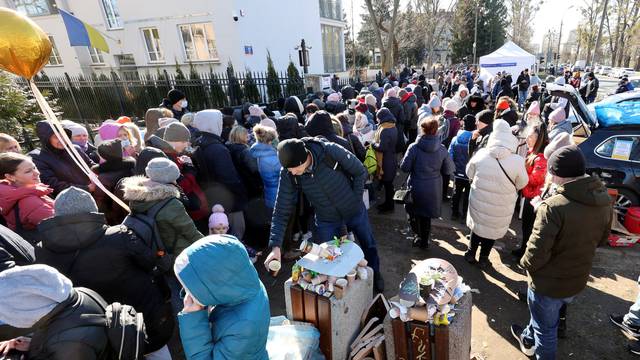 Refugees in front of the Ukrainian consulate in Warsaw