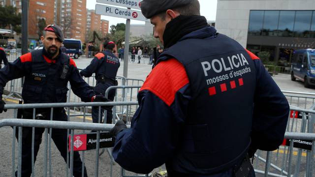 Police reinforce security before Real Madrid players arrive at their hotel in Barcelona