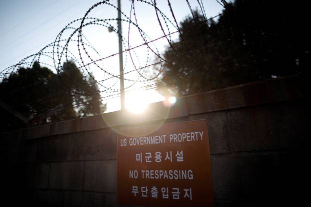 A barbed-wire fence is seen at a U.S. army base in Seoul