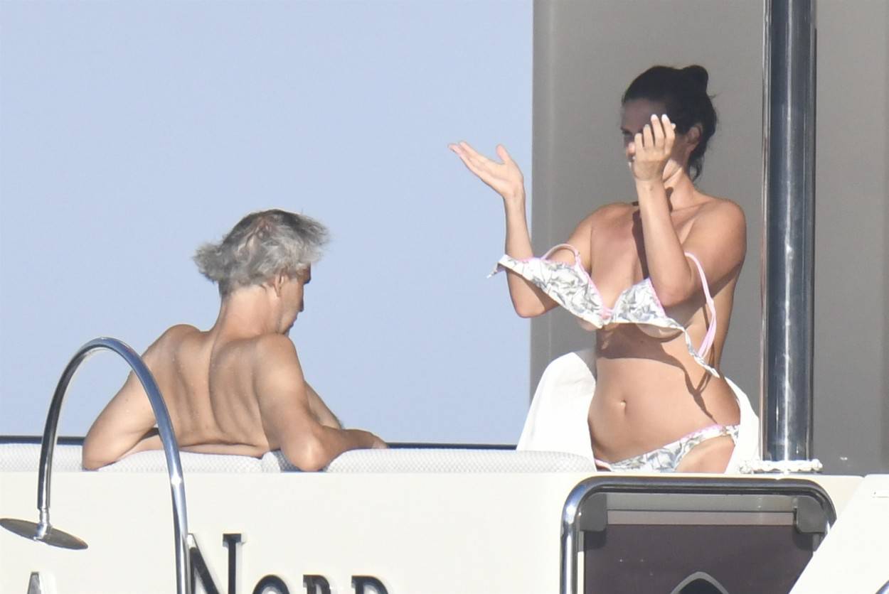 *PREMIUM-EXCLUSIVE* MUST CALL FOR PRICING BEFORE USAGE  - STRICTLY NOT AVAILABLE FOR ONLINE USAGE UNTIL 22:00 PM UK TIME ON 07/08/2022 - 

Italian operatic tenor Andrea Bocelli and his wife Veronica Berti put on a 'Cheeky' display during their sun-soaked 