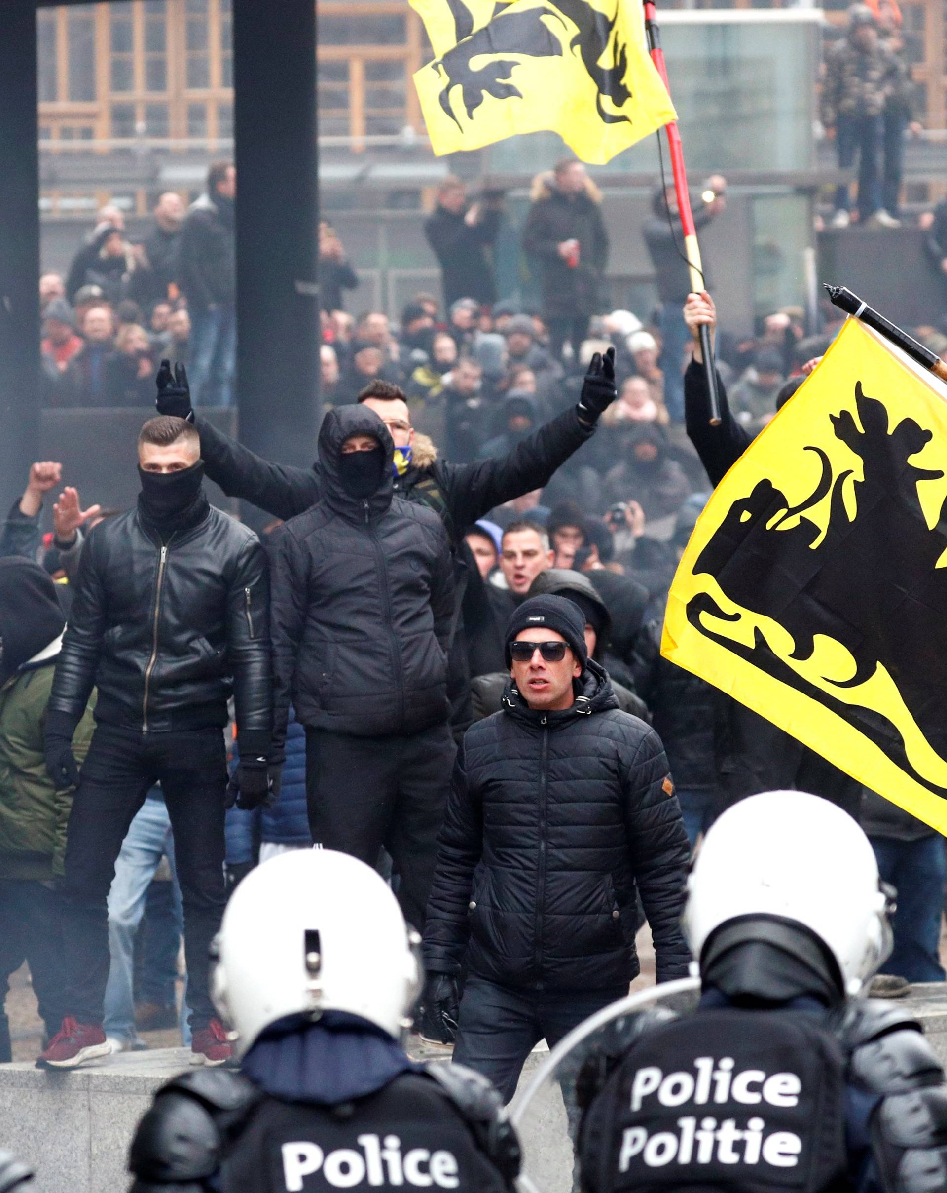 Far-right supporters attend a protest against Marrakesh Migration Pact in Brussels