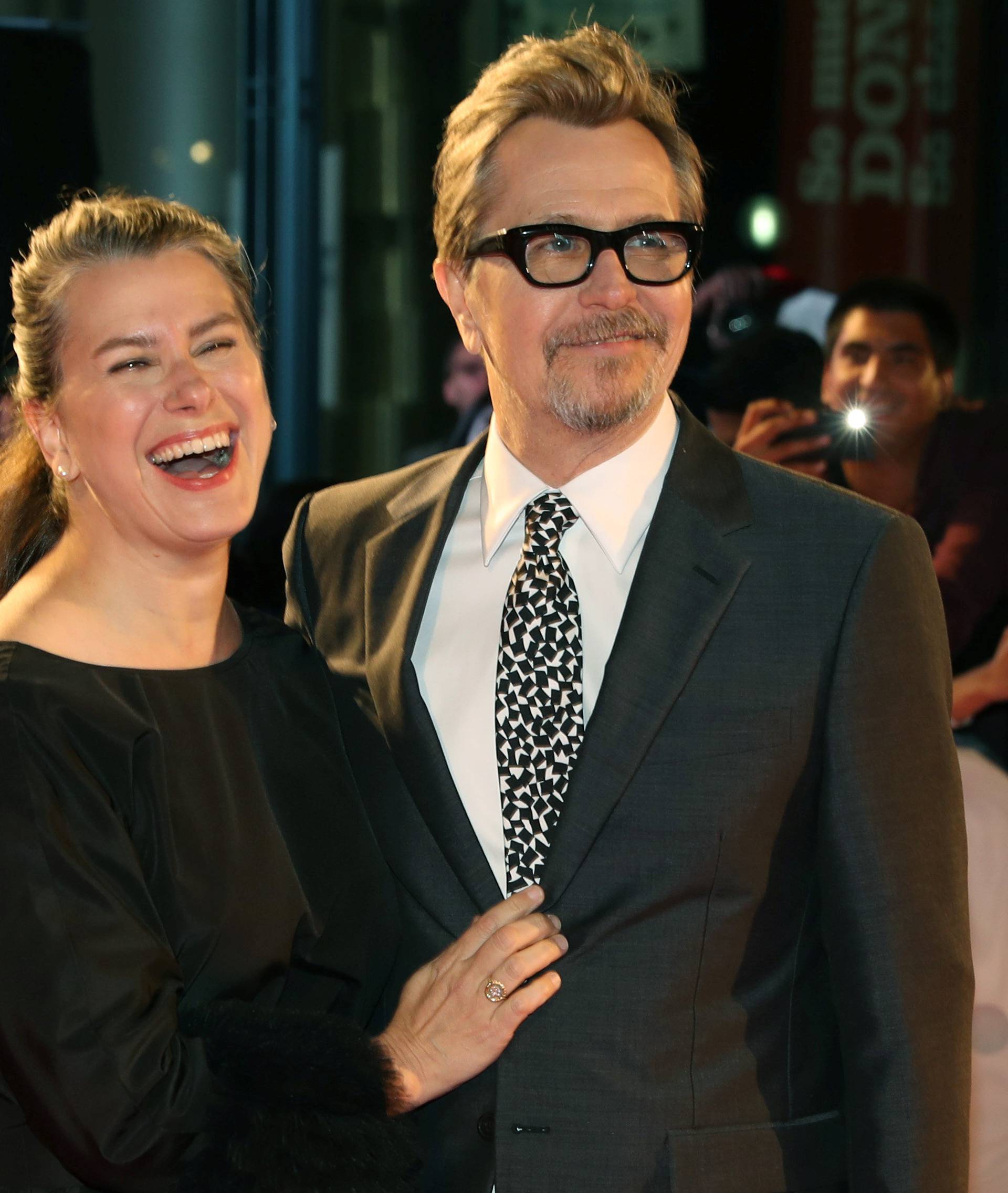 Actor Gary Oldman and his wife Gisele Schmidt arrive at the premiere of the film "Darkest Hour" at Toronto International Film Festival.