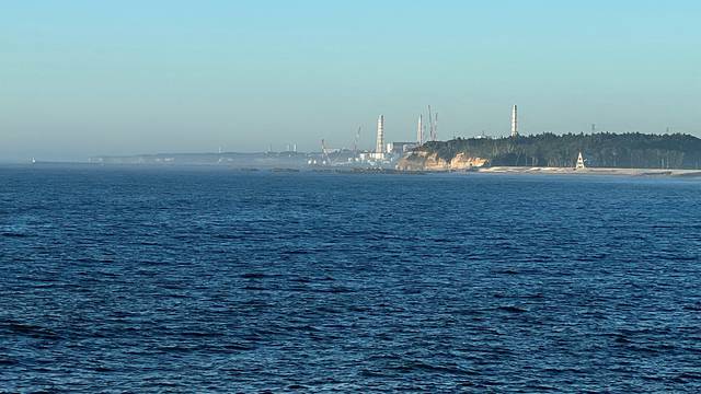 FILE PHOTO: A view of the Fukushima Daiichi nuclear power plant seen from the nearby Ukedo fishing port in Namie town