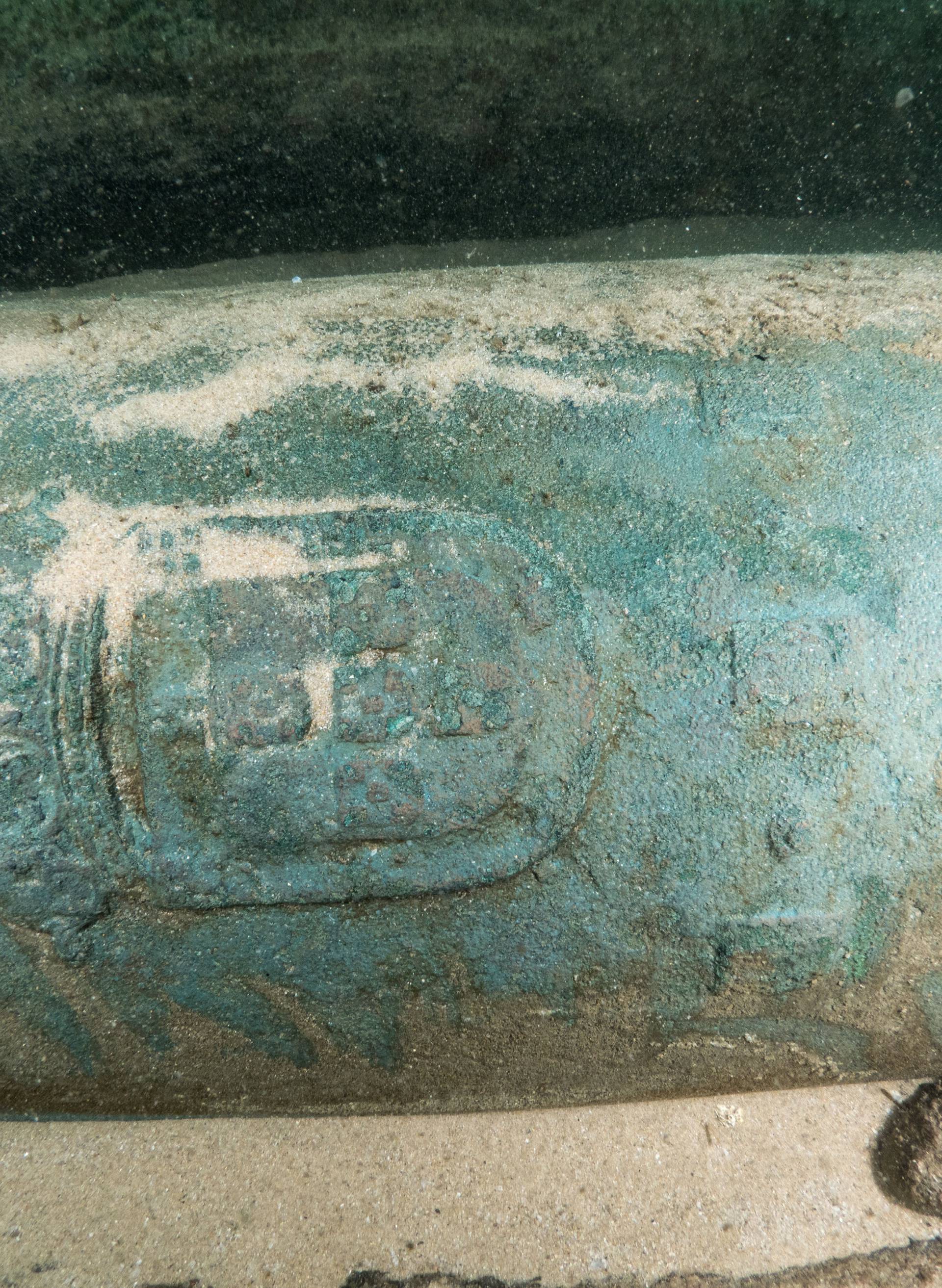 Divers are seen during the discovery of a centuries-old shipwreck, in Cascais